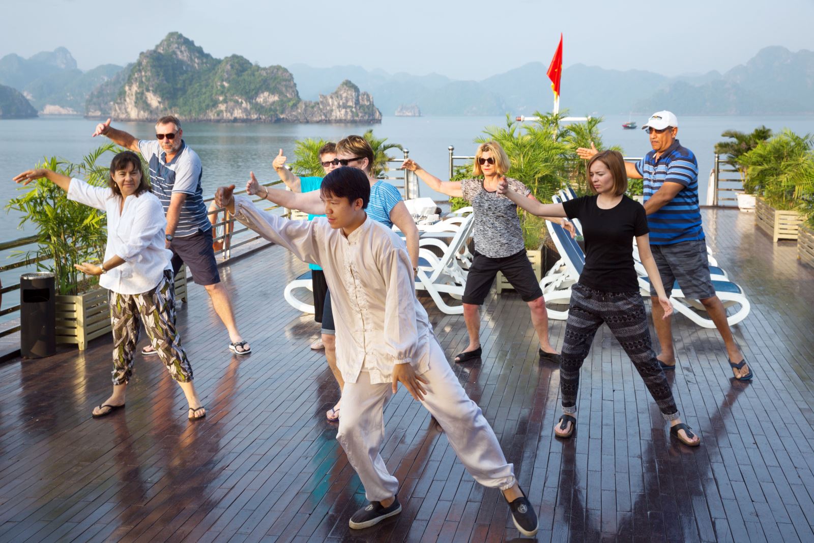 Practicing-Tai-Chi-by-the-sunrise-magnificent-Halong-Bay