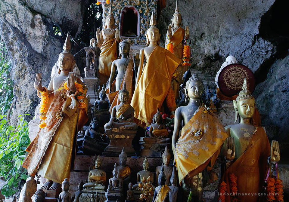 embark on a cruise up the Mekong River to Pak Ou Caves