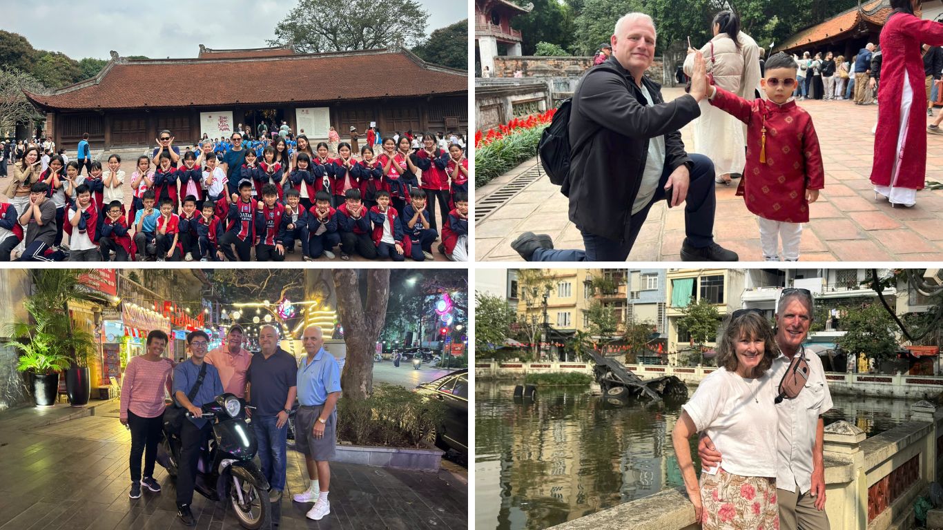 Group of travellers and local children interacting at Temple of Literature Hanoi Vietnam