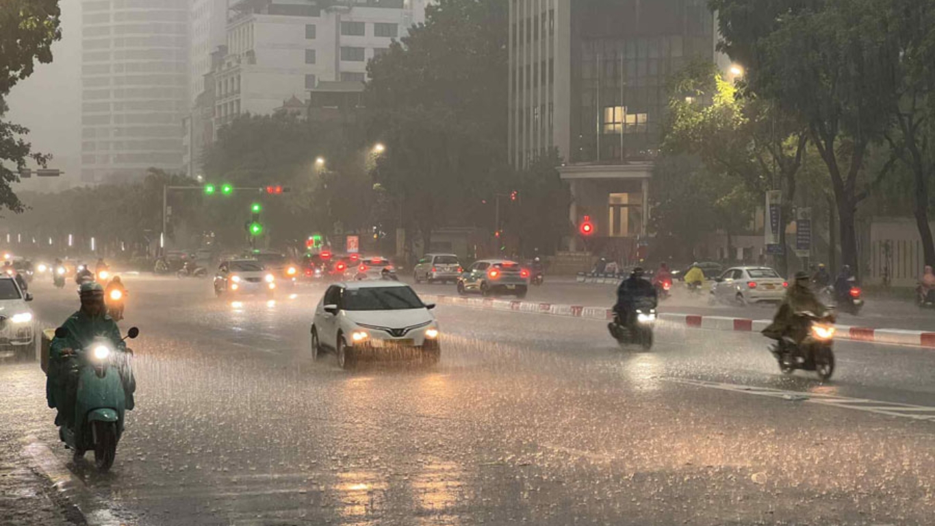 Hanoi street in heavy rain in September